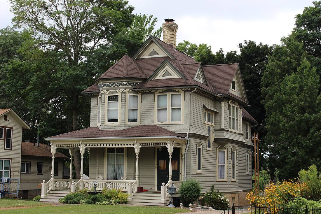 Queen Anne Victorian with decorative spindlework porch, typical of Essex County's historic homes